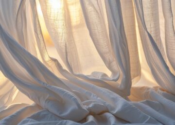 Light coming through textured white curtain