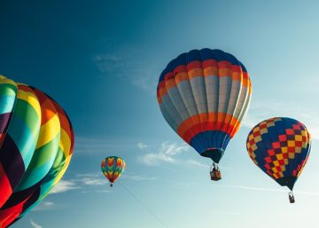 Hot air balloons lifting