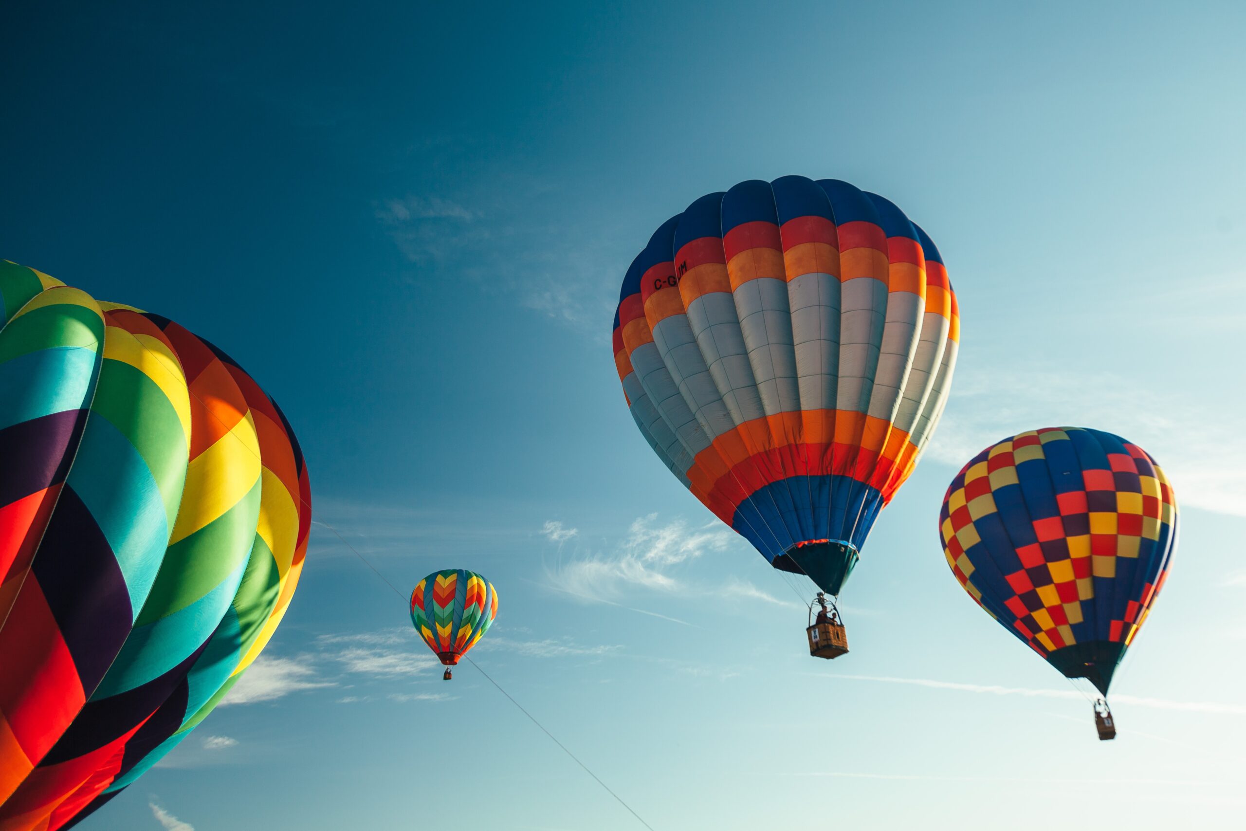 Hot air balloons lifting