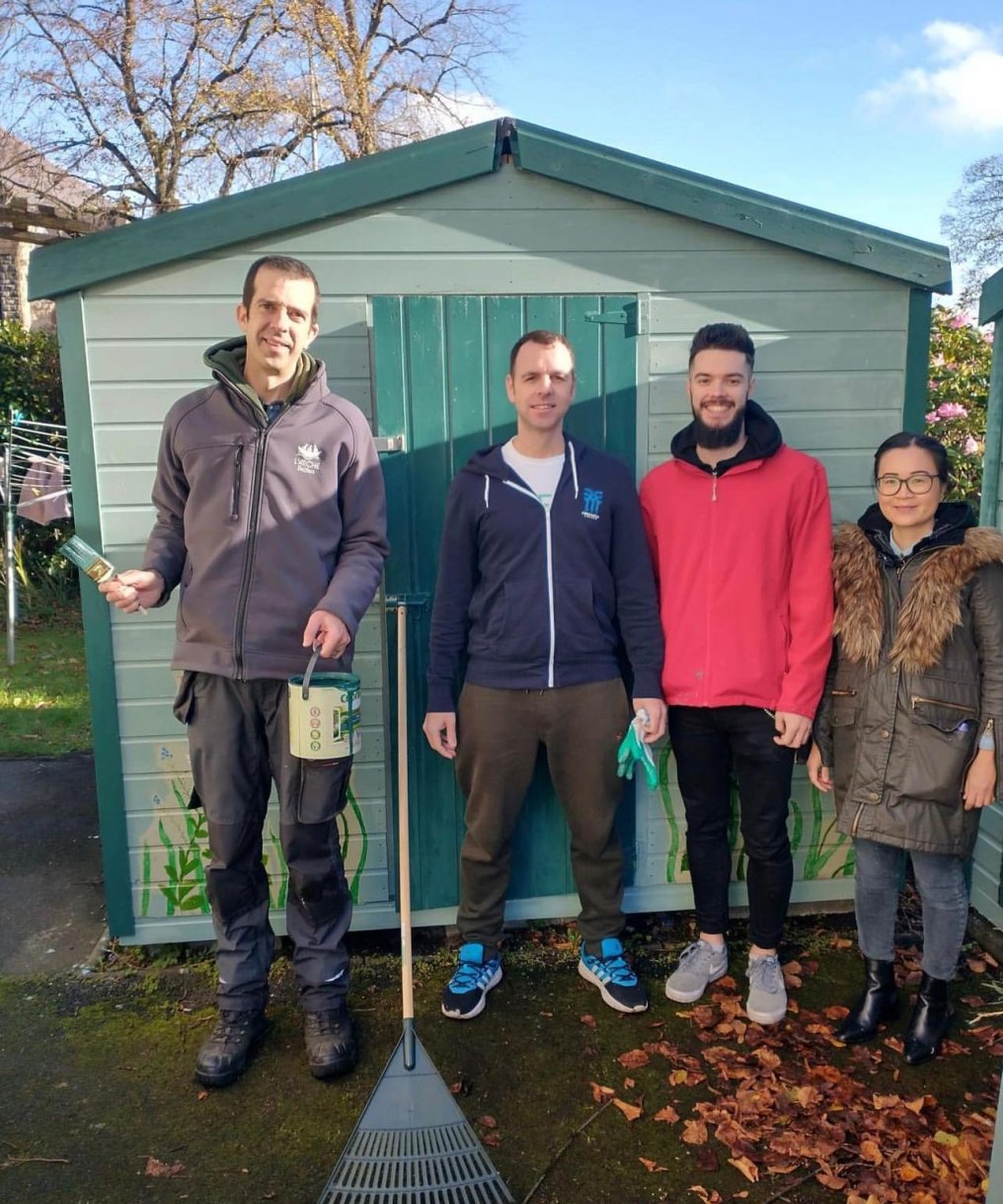 IQ EQ volunteers painted sheds at L Arche Belfast IQ EQ