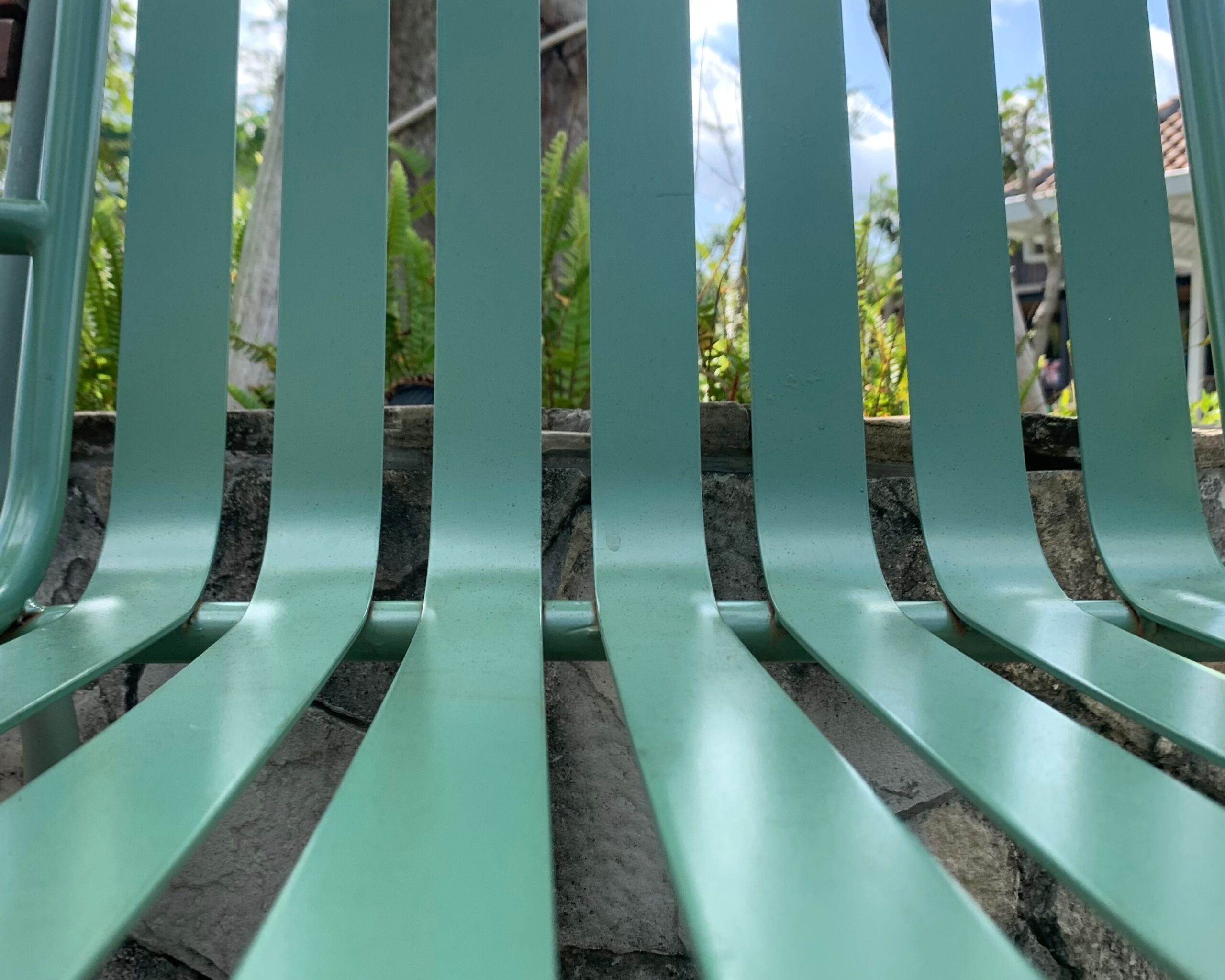 Close-up of green bench