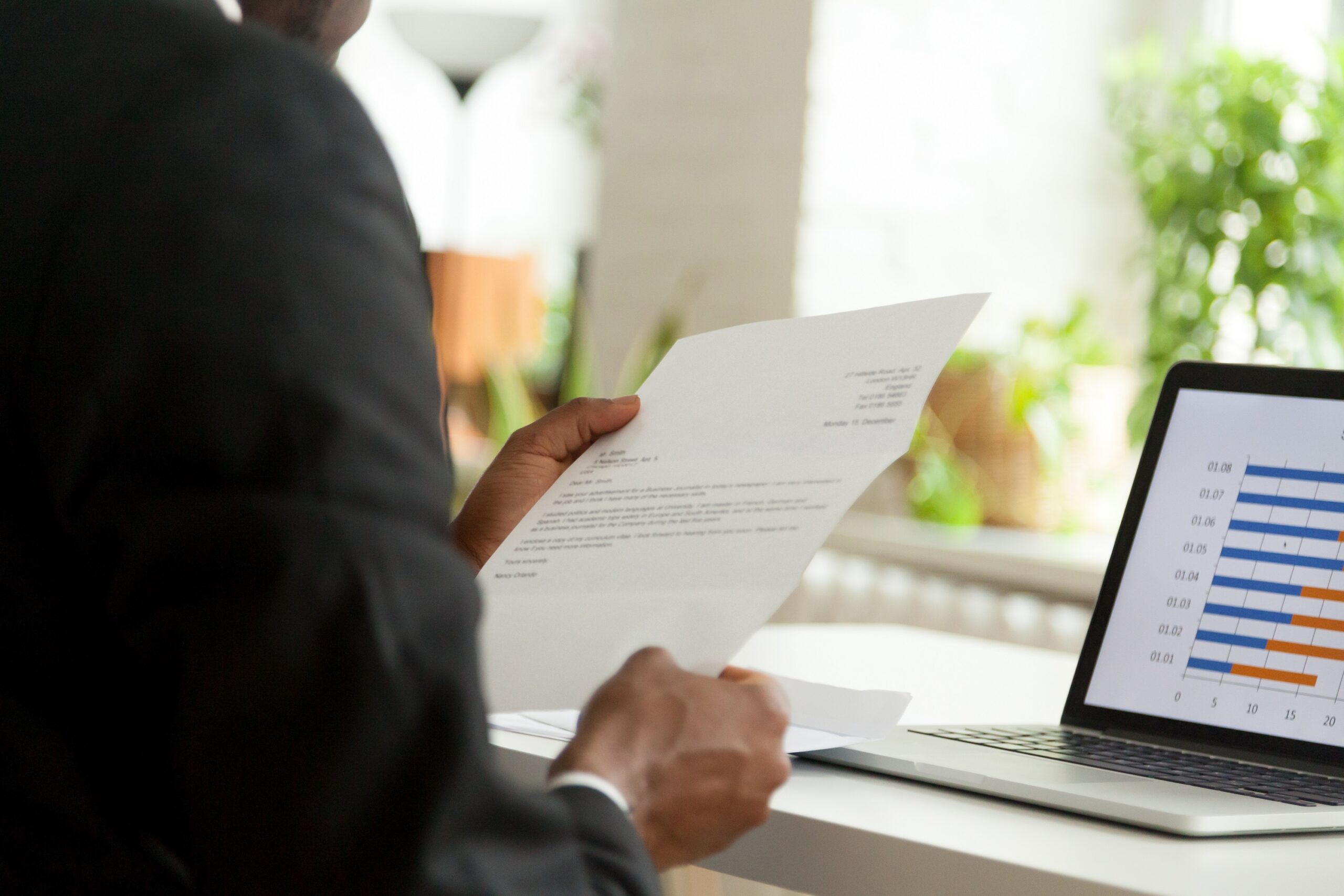 Businessman reading a letter.