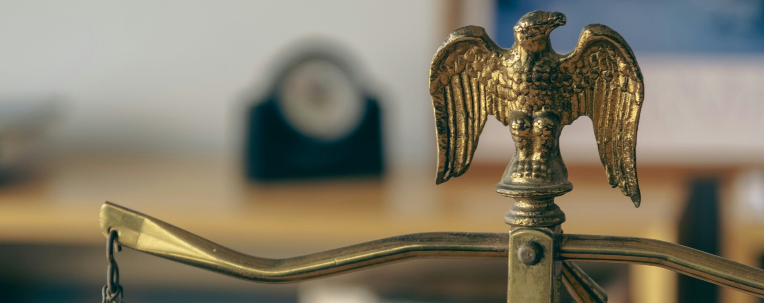 Golden scales with eagle